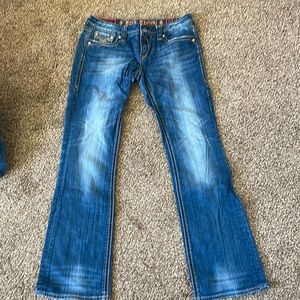 Womens size 30 Rock Revival jean. Sora boot style